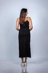 Back view of black maternity bodycon maxi dress, featuring a long, elegant fit designed for comfort and style during pregnancy.