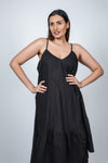 Front pose of black maternity layered high-low dress with spaghetti straps, featuring a relaxed fit and flowy design for pregnant moms-to-be.