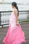 Side view of Blush Ombre Maternity Evening Gown, showcasing its flowing silhouette and sleeveless design, perfect for moms-to-be.