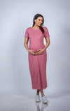 Close-up view of Blush Pink Maternity T-Shirt Dress, highlighting the soft, breathable fabric and comfortable fit for expecting mothers.