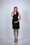 Side-angled view of the Classic Black Maternity Sleeveless Bodycon Dress, showing the flattering body-hugging silhouette.