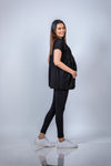 Side view of the Classic Black Maternity T-Shirt, featuring the soft, flowy fabric and flattering fit for pregnancy comfort.
