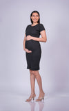 Side view of Classic Black Maternity Bodycon Dress, highlighting the comfortable fit and curve-hugging design.