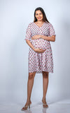 Close-up view of Classic White Maternity Dress, highlighting its comfortable and elegant design.