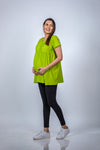 Angled view of Neon Green Babydoll Maternity T-Shirt, highlighting the flattering fit and comfortable design for expecting moms.