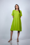 Right-angle view of the Neon Green Maternity A-Line T-Shirt Dress, displaying the flowy silhouette.