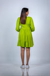 Back view of Neon Green Maternity Fit & Flare T-Shirt Dress, showcasing the breathable fabric and comfortable fit for moms-to-be.