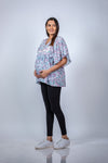 Angled view of Pastel Paisley Fit & Flare Maternity Top, highlighting the flattering fit and ample room for the growing bump.