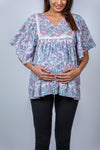 Close-up view of Pastel Paisley Fit & Flare Maternity Top, highlighting the flattering design and comfortable fit for moms-to-be.