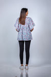Side view of Pastel Paisley Fit & Flare Maternity Top, offering a flowy, relaxed fit for expecting moms.