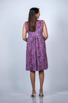 Back view of the Purple Floral Maternity Fit & Flare Dress, highlighting the flowing design and breathable fabric.