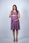 Close-up view of the Purple Floral Maternity Fit & Flare Dress, highlighting the vibrant floral pattern and sleeveless comfort.