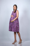 Front view of the Purple Floral Maternity Fit & Flare Dress showcasing the sleeveless design and comfortable fit for moms-to-be.