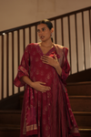 Angled view of Regal Maroon Maternity Kurti Set with Dupatta, showcasing an elegant and comfortable fit for moms-to-be.
