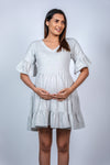 Close-up view of Soft Heather Grey Layered Maternity T-Shirt Dress, highlighting the layered design and comfortable fit for moms-to-be.