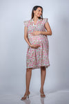 Close-up view of Soft Pink Paisley Bliss Fit n' Flare Maternity Dress, showing the intricate paisley print and delicate ruffle sleeve details.
