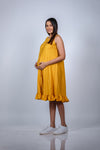 Side view of Sunshine Yellow Fit & Flare Maternity Dress, showcasing the flattering flowy silhouette designed for moms-to-be.