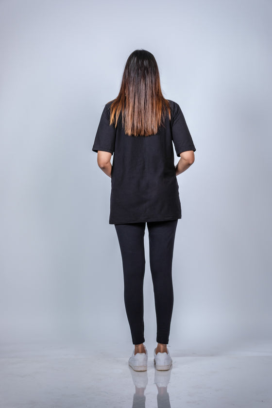 Back view of black nursing T-shirt, showcasing its relaxed fit and breathable design, ideal for pregnancy and nursing.