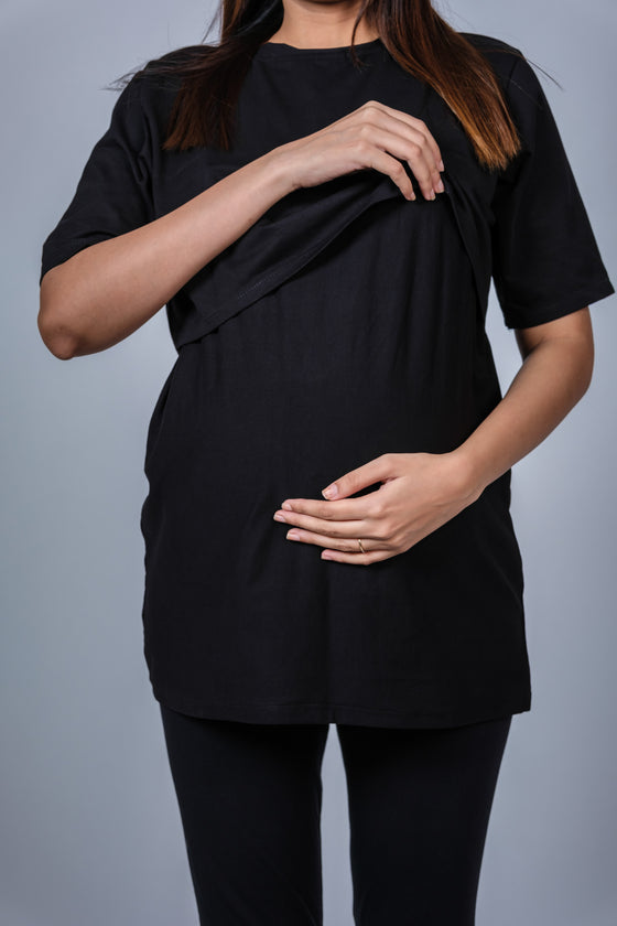 Front pose of black nursing T-shirt, featuring a relaxed fit with discreet nursing access for easy breastfeeding and comfort during pregnancy.