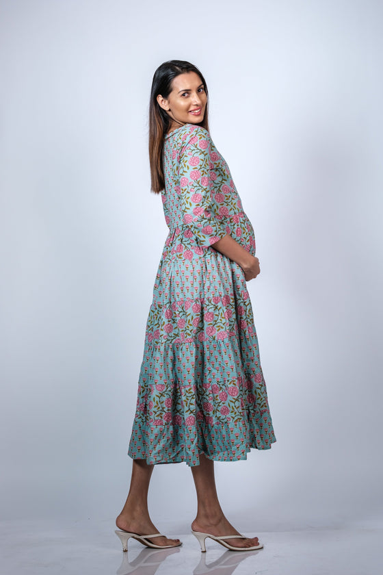 Side view of Blue Floral 3-Layered Maternity Dress, showing the flowy layers and the relaxed fit for a growing baby bump.