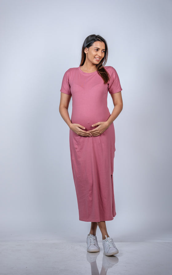 Close-up view of Blush Pink Maternity T-Shirt Dress, highlighting the soft, breathable fabric and comfortable fit for expecting mothers.