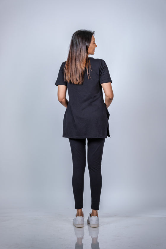 Back view of the Classic Black Maternity T-Shirt, showing the relaxed fit and comfortable length.