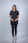 Front view of the Classic Black Maternity T-Shirt, showcasing a relaxed fit designed for moms-to-be.