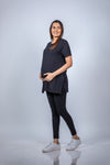 Side view of the Classic Black Maternity T-Shirt, highlighting its comfortable, bump-friendly design.