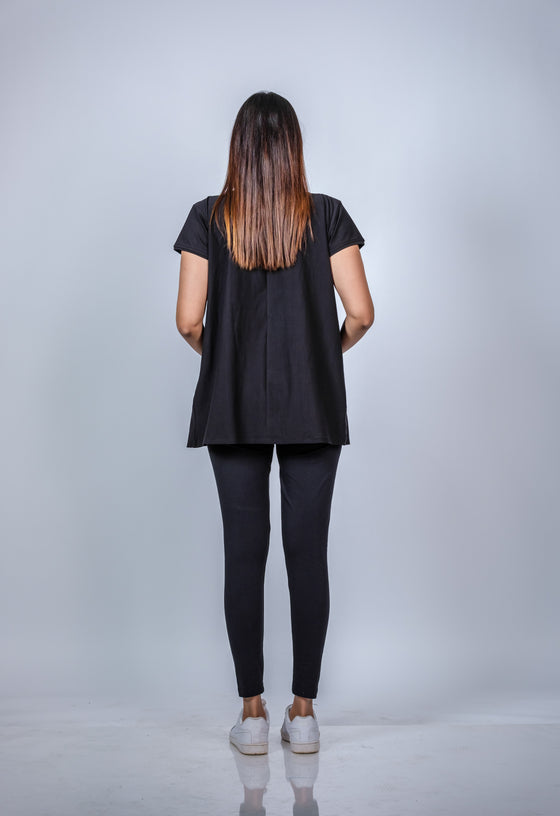 Back view of the Classic Black Maternity T-Shirt, showing the breathable and relaxed fit, perfect for everyday wear.