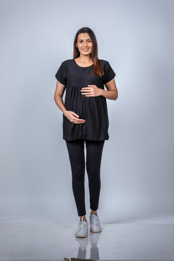 Front view of the Classic Black Maternity T-Shirt, showcasing the relaxed fit and flattering design for moms-to-be.