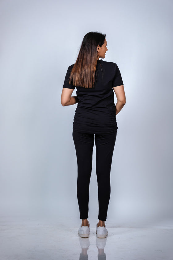 Back view of Classic Black Ruched Maternity T-Shirt, showcasing the timeless design and comfortable fit for expecting moms.