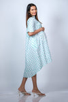 Angled view of Mint Blue Maternity High-Low Dress, showcasing the flowing silhouette and flattering design for growing bumps.