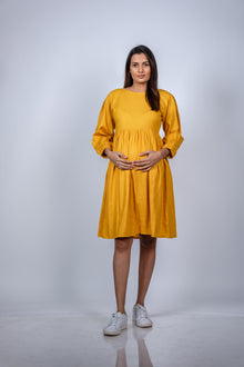  Front view of Mustard Yellow Fit & Flare Maternity Dress, featuring a vibrant mustard hue and comfortable fit for moms-to-be.