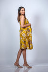 Side view of Mustard Yellow A-Line Maternity Dress highlighting the floral pattern and flattering A-line silhouette.