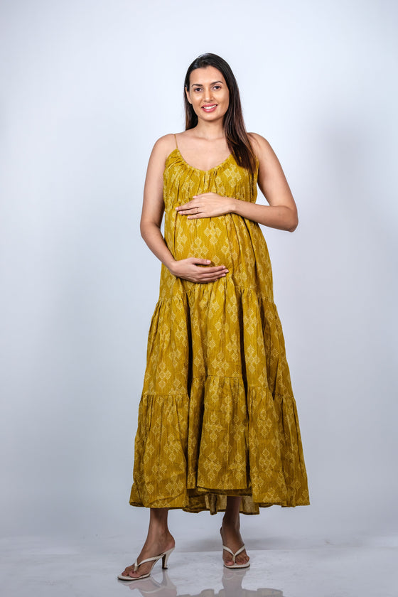 Front view of Mustard Yellow 3-Layered Maternity Dress showcasing a flowy design with adjustable spaghetti straps, perfect for moms-to-be.