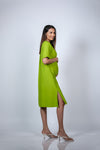 Close-up view of the side slit on the Neon Green Maternity A-Line T-Shirt Dress, adding a stylish touch.
