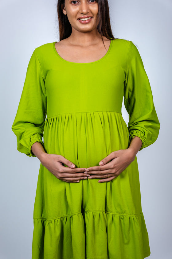 Close-up of Neon Green Maternity Fit & Flare T-Shirt Dress, featuring a flattering fit and vibrant neon green color for a stylish maternity look.