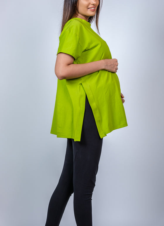 Close-up view of the Neon Green Maternity T-Shirt, highlighting its vibrant color and flattering design for moms-to-be.