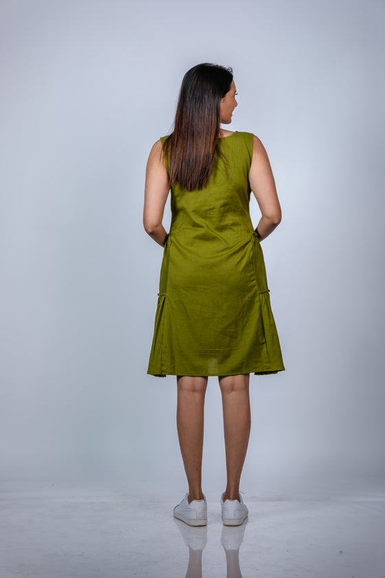 Back view of Olive Green Fit & Flare Maternity Dress, highlighting the flowy and comfortable fit for moms-to-be.