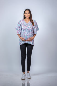  Front view of Pastel Paisley Fit & Flare Maternity Top, showcasing a comfortable and stylish fit with a soft pastel paisley print.