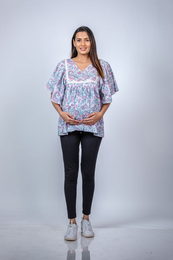 Front view of Pastel Paisley Fit & Flare Maternity Top, showcasing a comfortable and stylish fit with a soft pastel paisley print.