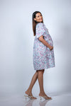 Side view of Pastel Paisley Maternity Fit & Flare Flutter-Sleeve Dress, offering a relaxed fit and showcasing the airy flutter sleeves.