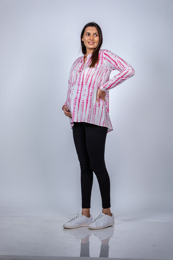 Angled view of Pink Tie-Dye Maternity Shirt, highlighting the relaxed fit and breathable fabric, perfect for casual outings or home wear.