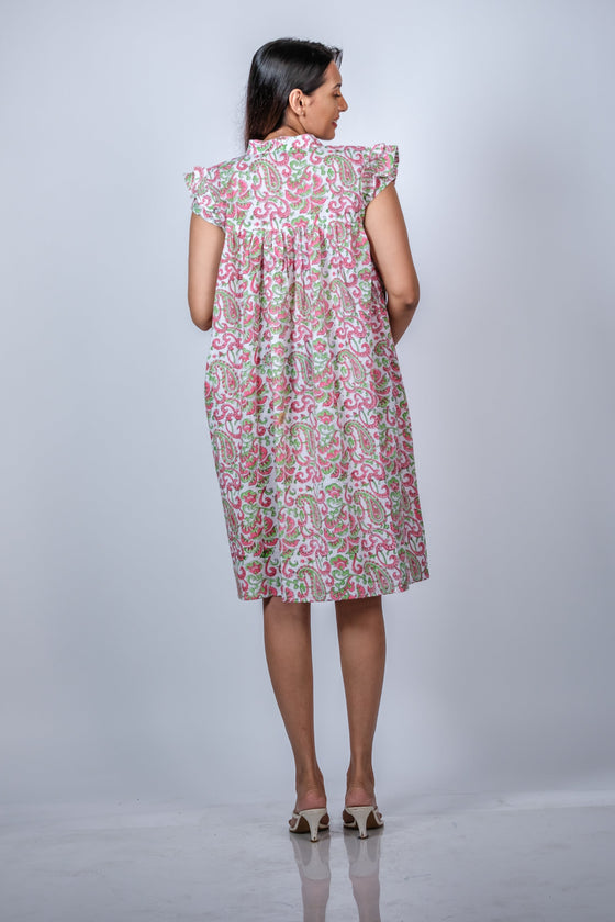 Side view of Soft Pink Paisley Bliss Fit n' Flare Maternity Dress, highlighting the comfortable design for growing bumps.