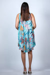 Back view of Tropical Floral Maternity Umbrella Dress displaying the breezy sleeveless design, perfect for keeping cool.