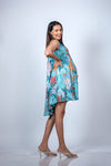 Side view of Tropical Floral Maternity Umbrella Dress with a relaxed fit, ideal for casual outings and beach days.