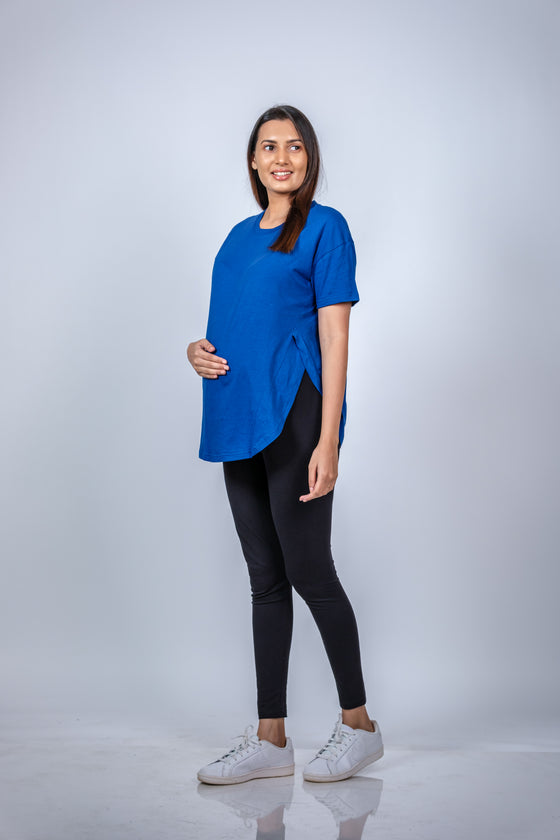 Angled view of Vibrant Blue Maternity T-Shirt, highlighting the flattering and relaxed fit for expecting mothers.