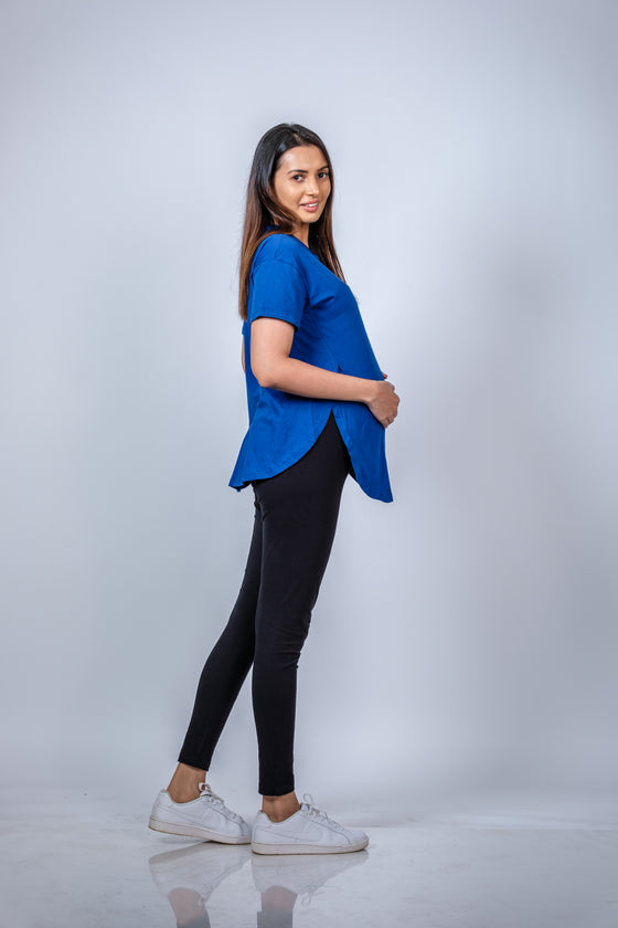 Side view of Vibrant Blue Maternity T-Shirt, offering ease of movement and a chic, versatile design.
