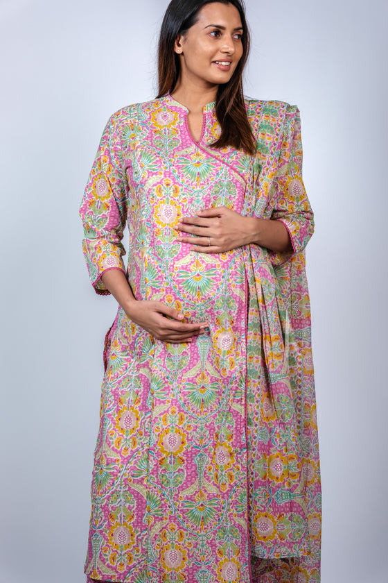 Angled view of Vibrant Pink Floral A-Line Maternity Kurti Set, featuring a floral design and matching dupatta, perfect for special occasions.