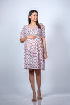 Front view of White Floral Fit n' Flare Maternity Dress, showcasing a comfortable and stylish fit for moms-to-be.